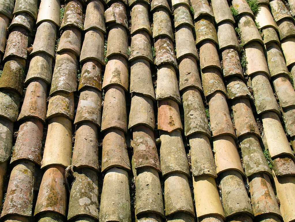Slate roofline over a city skyline